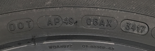 Photo of tire sidewall showing DOT number